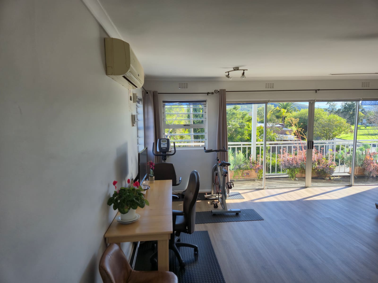 The planning desk in the practice, overlooking the balcony garden in Die Boord