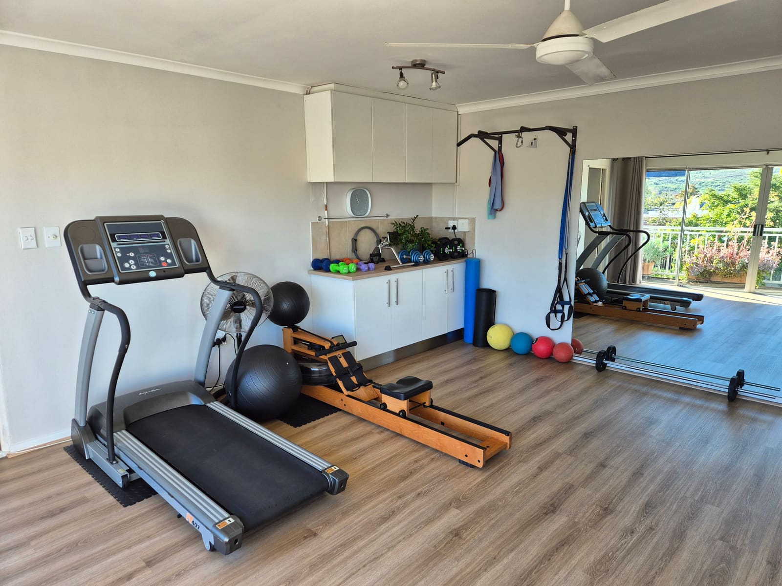 Inside the biokinetics practice in Die Boord, Stellenbosch — cardio and open mat space